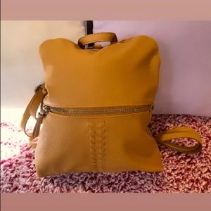 Mustard yellow mini backpack no damage like new